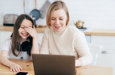 A woman and daughter work together