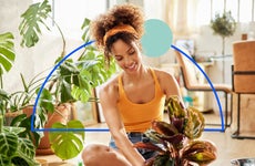 Woman watering plants.