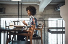 Woman online banking with a tablet