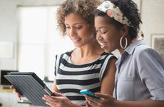 Women using tablet